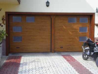 szekcion&aacute;lt kapu, kaputechnika, lakoss&aacute;gi gar&aacute;zskapu, lakoss&aacute;gi gar&aacute;zsajt&oacute;, gar&aacute;zskapu, gar&aacute;zsajt&oacute;, lakoss&aacute;gi szekcion&aacute;lt kapuk, szekcion&aacute;lt gar&aacute;zskapuk, lamell&aacute;s kapuk, hőszigetelt szekcion&aacute;lt kapu,